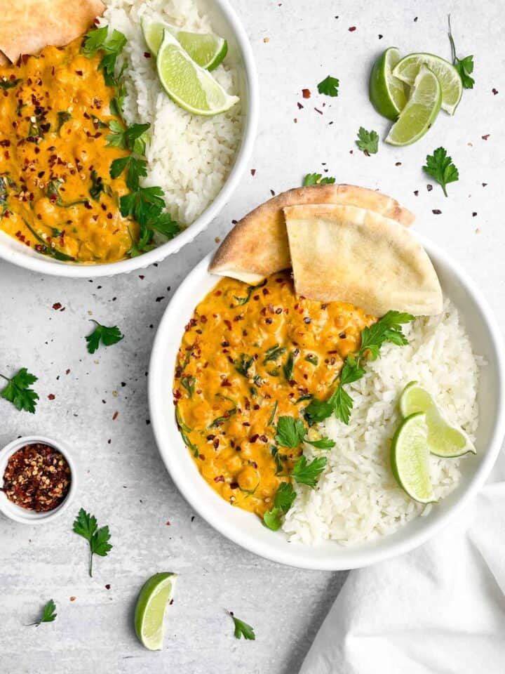 Vegan Chickpea Curry made with coconut milk, chickpeas, and spinach. Can be easily made in one pot in under 30 minutes!