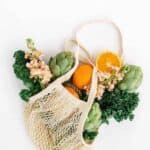 mesh bag filled with fruits and vegetables