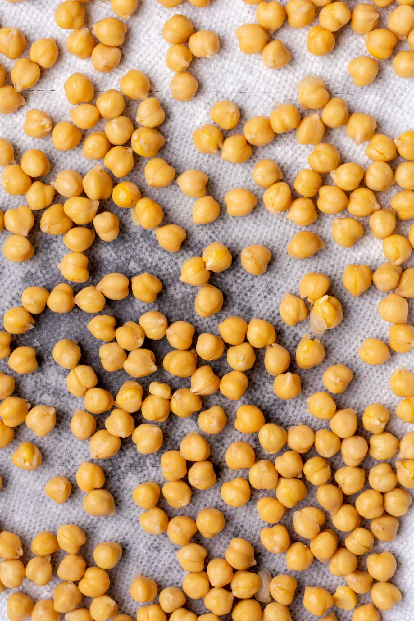 wet chickpeas on a paper towel