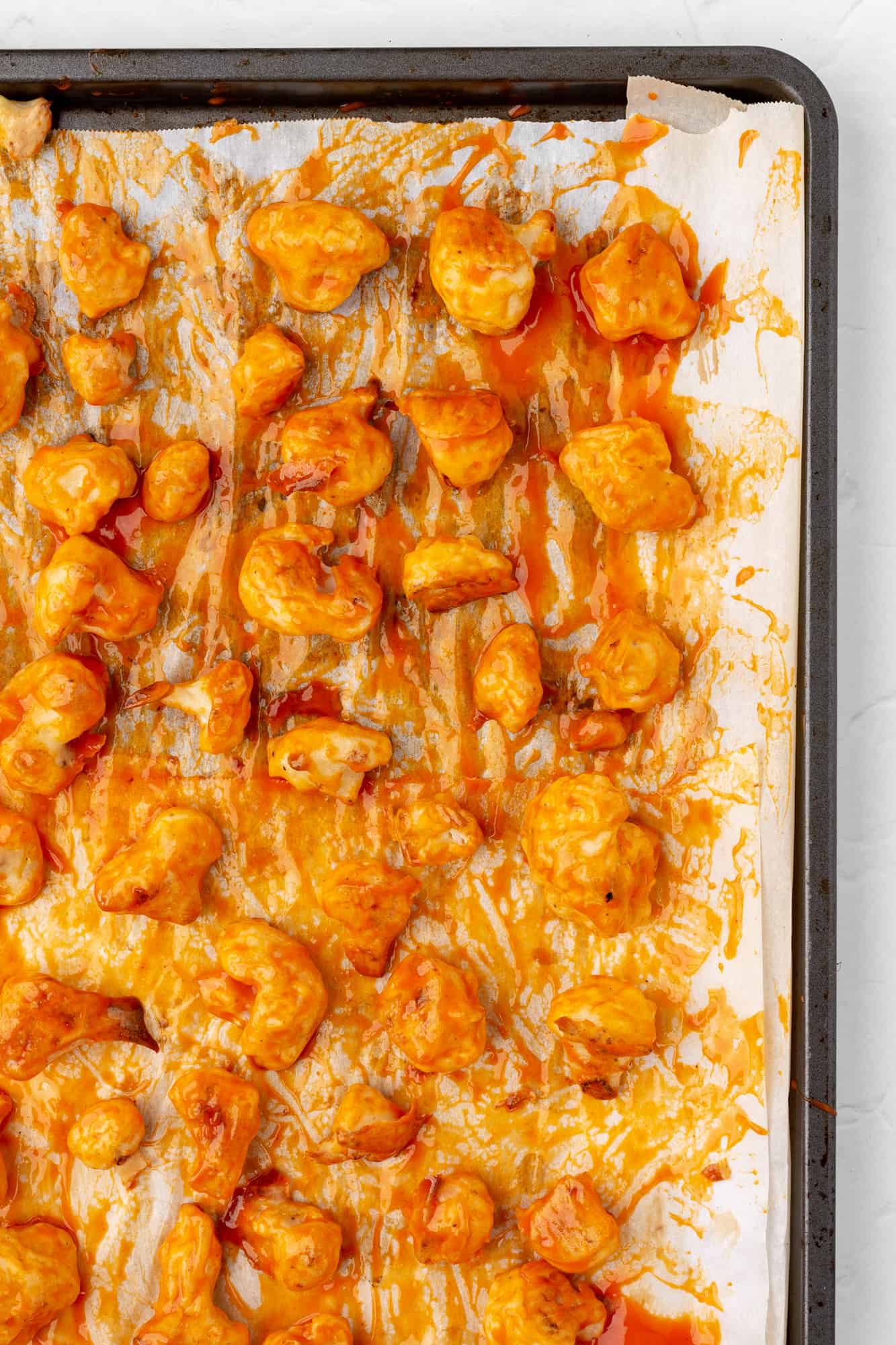 roasted cauliflower tossed in a buffalo sauce