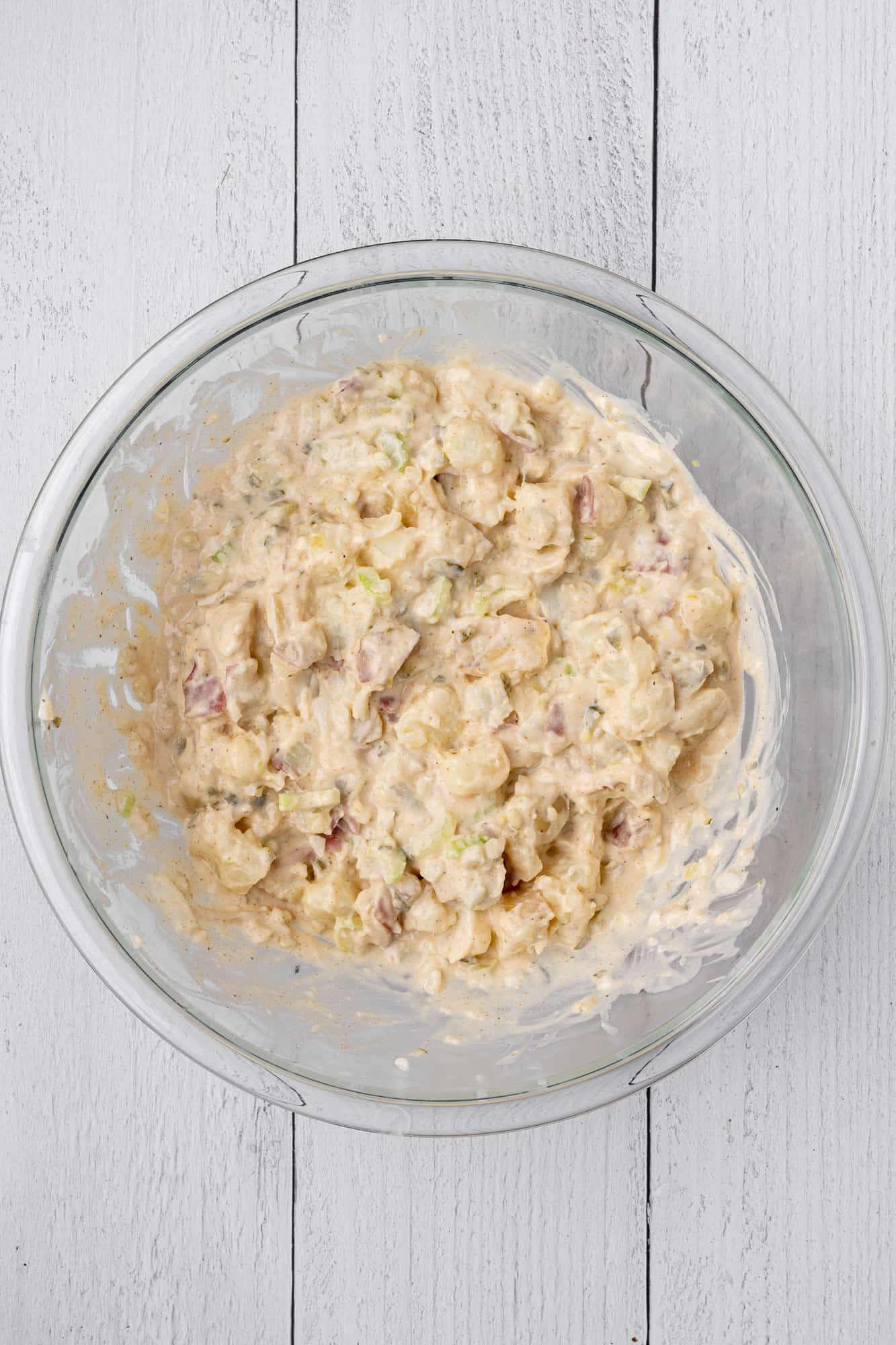 vegan potato salad mixed in a bowl