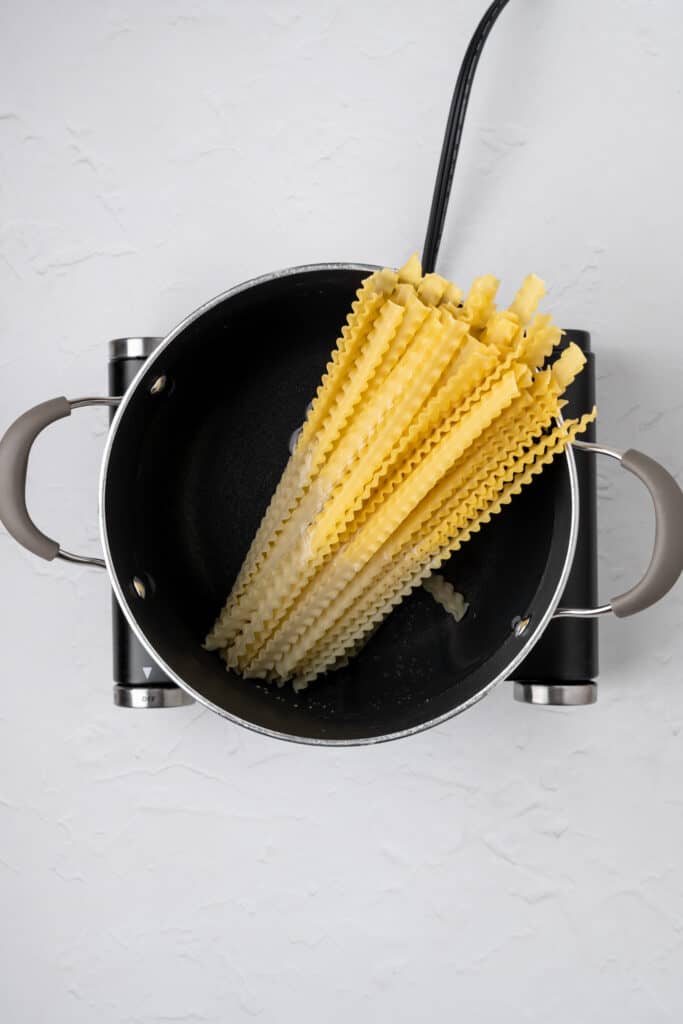 pasta in a pot with salted water