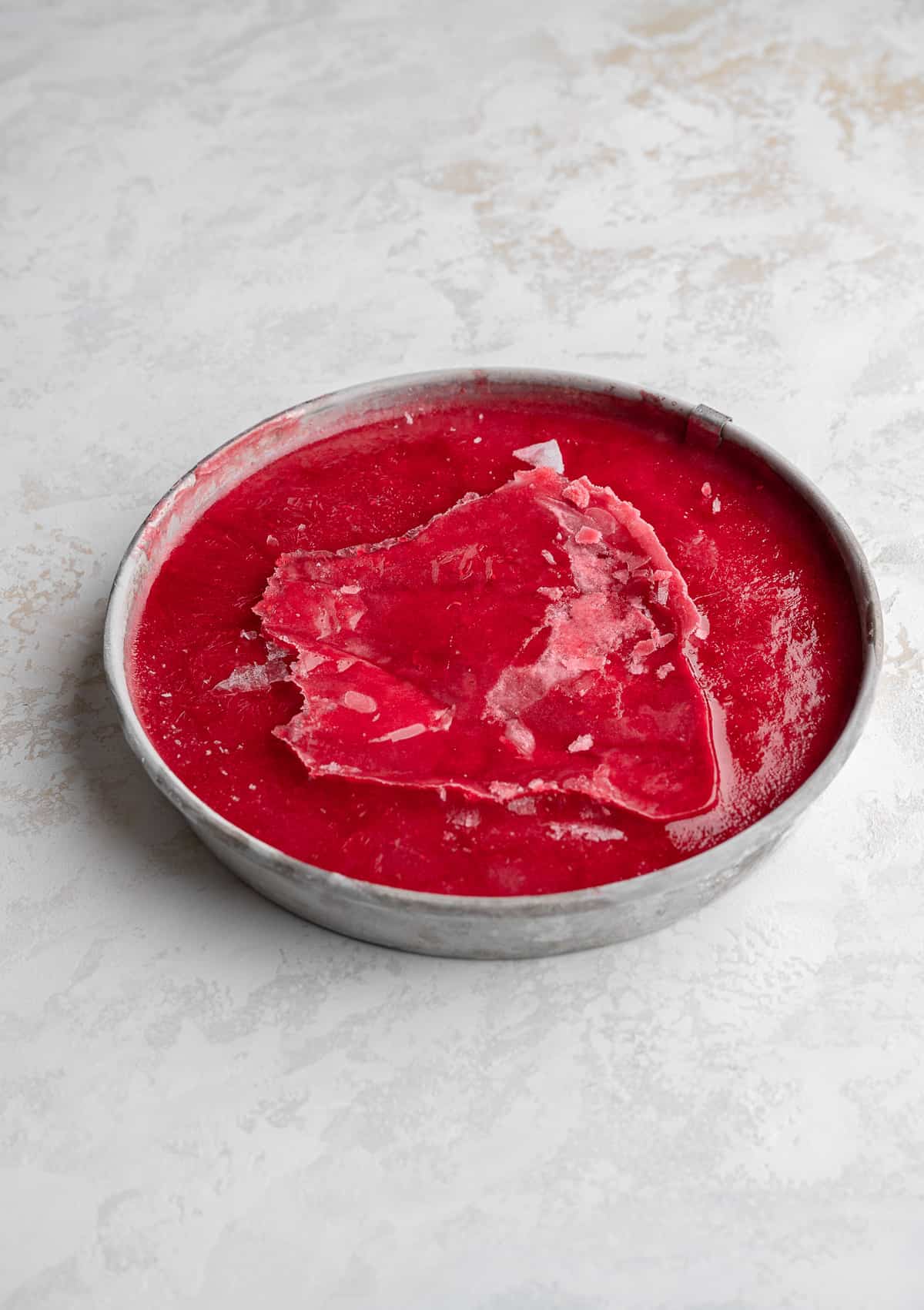 frozen raspberry sorbet in a 9-inch cake pan