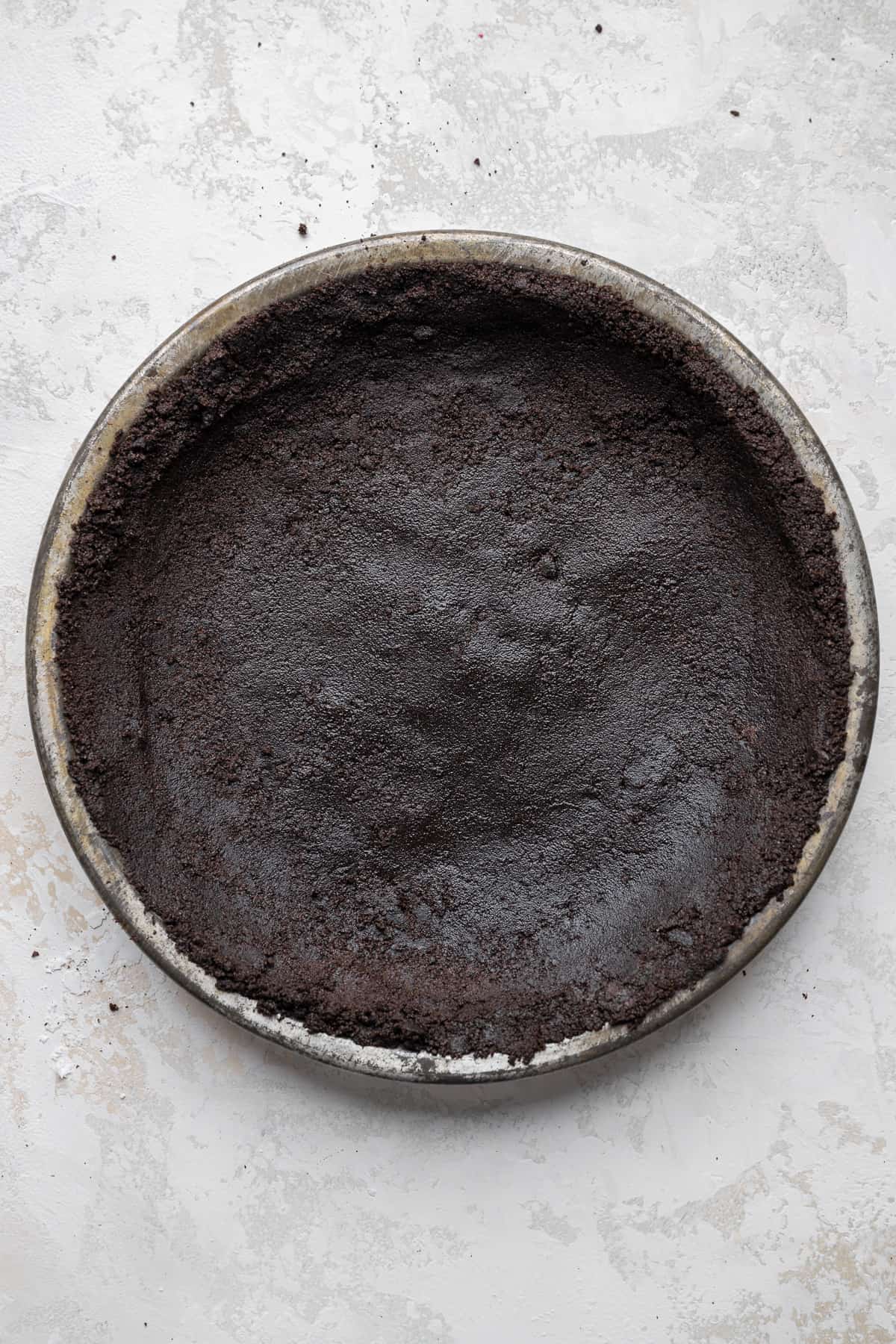 Oreo crust pressed into a pie pan