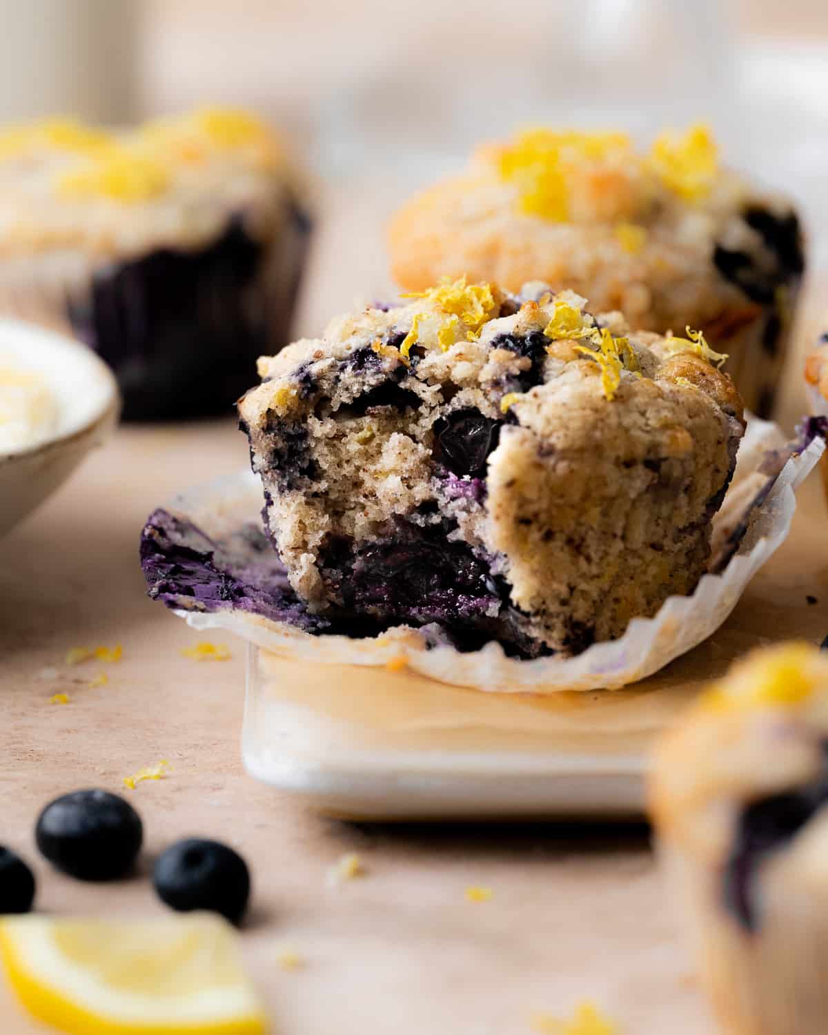 lemon blueberry muffins with a bite taken out