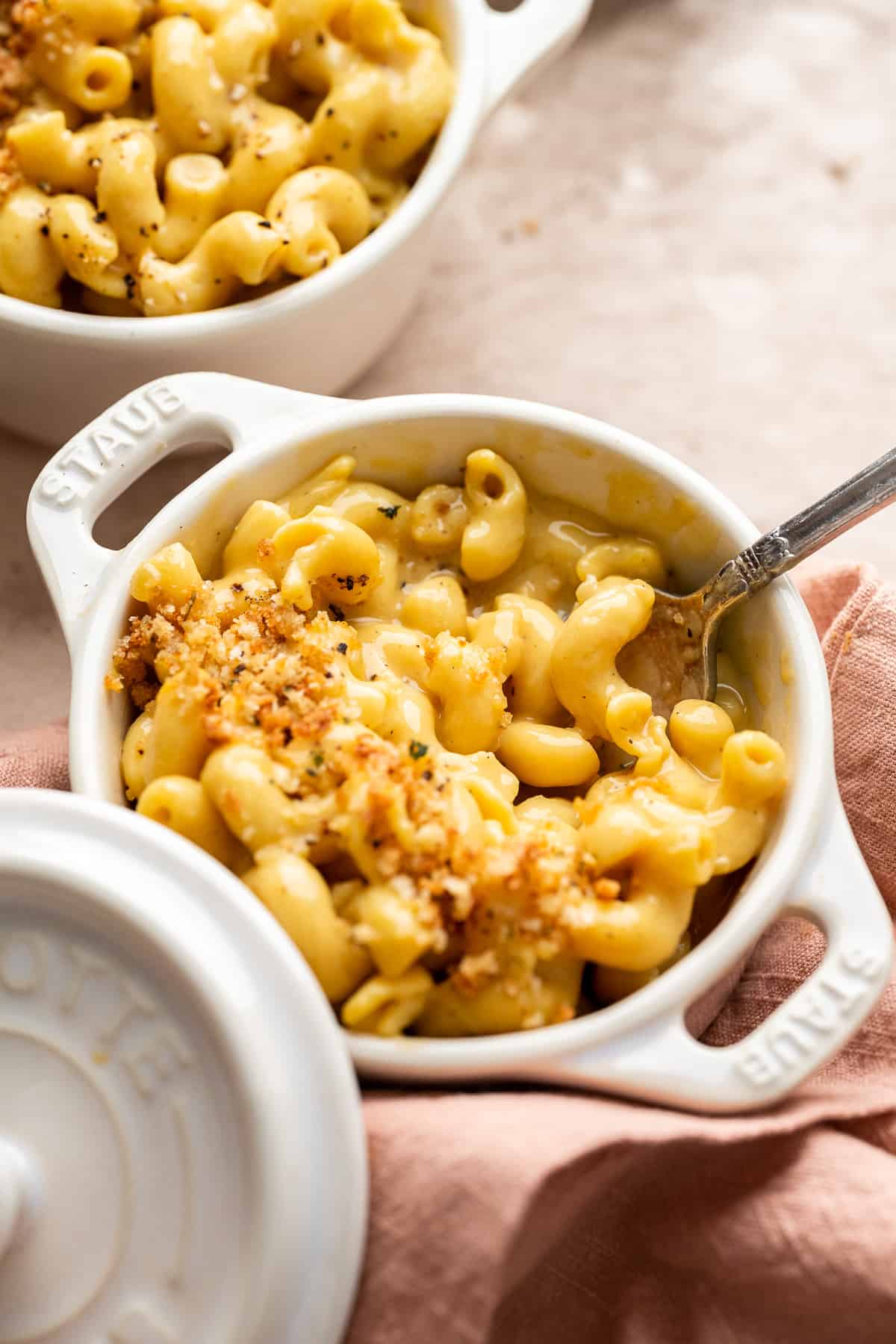 vegan mac and cheese being eaten with a fork.