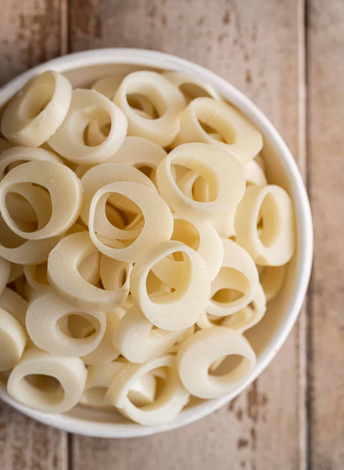 hearts of palm sliced into rings in a bowl.