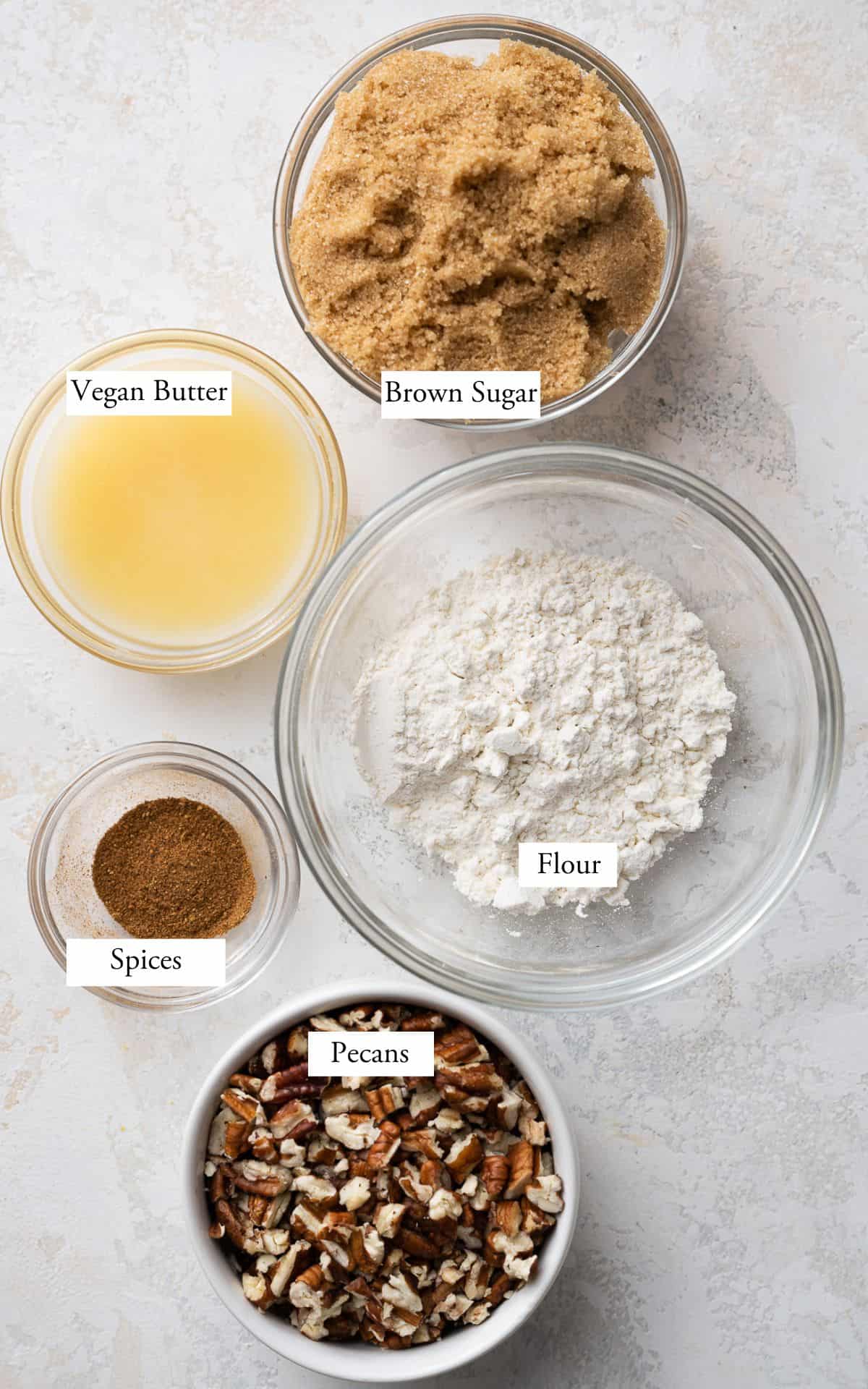 pecan streusel ingredients: pecans, flour, vegan butter, brown sugar, and spices.