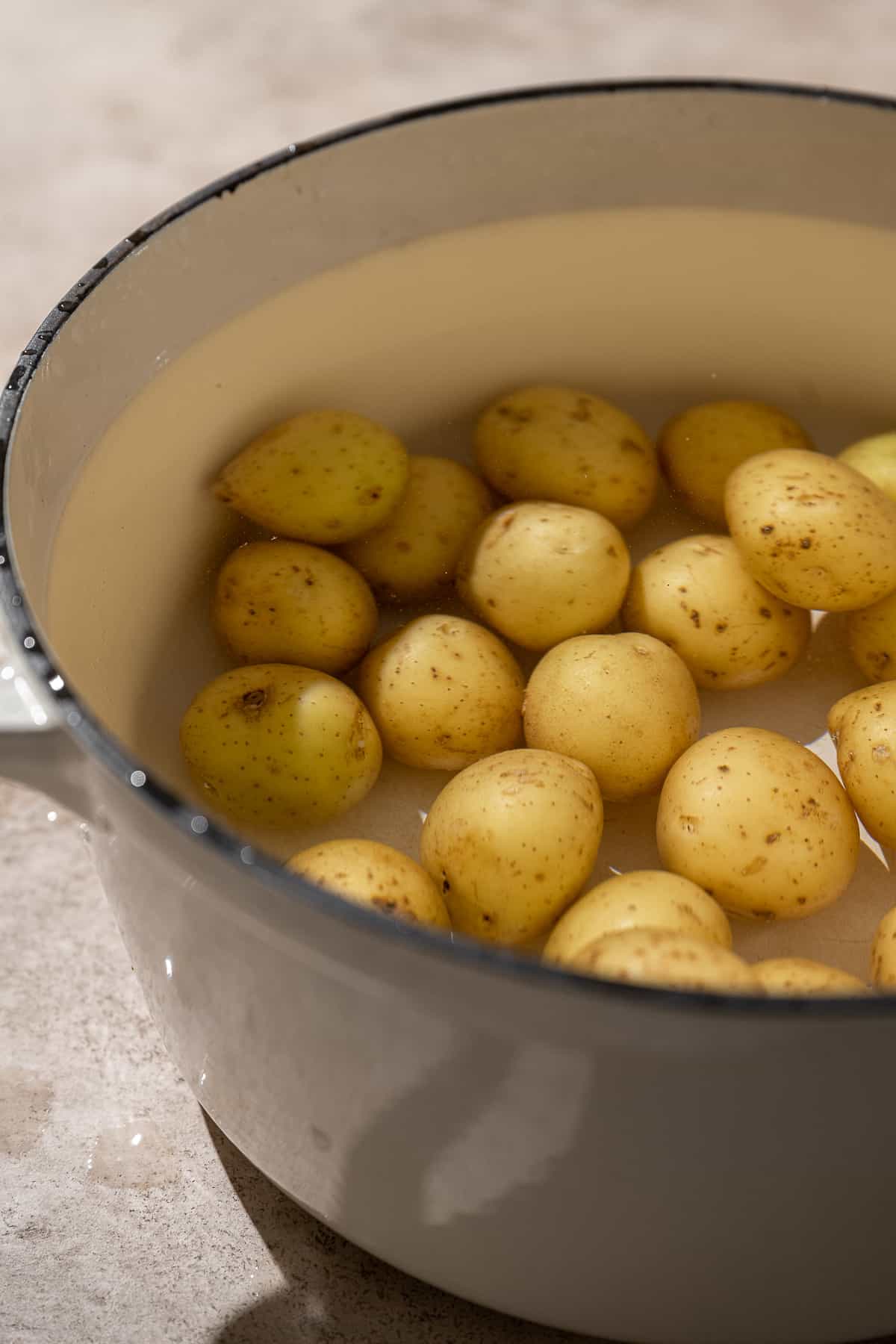 yukon gold potatoes in a pot of water.